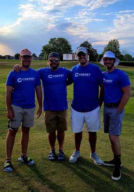 CRG Employees on the golf course